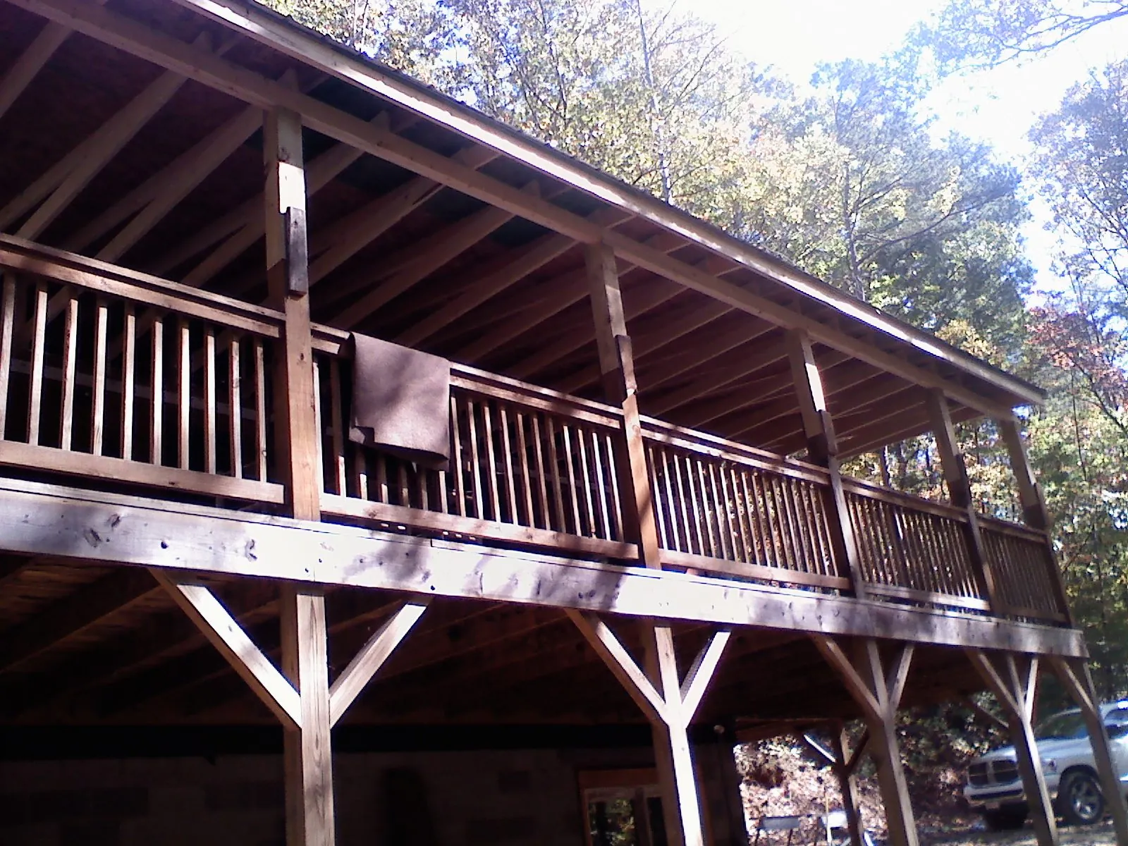 Timber framing under a new elevated porch and deck — Roof Leak Repair in Kenai by Roofing Brothers